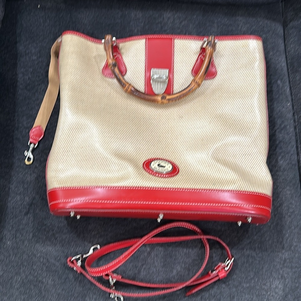 Dooney&Bourke purse with shoulder strap.